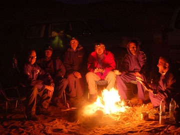 Libya: NARG field party near Sabha, Libya in 2010. Camping out on a cold night in the Sahara!