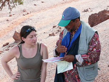 Morocco: Dr Cat Baudon (NARG) discusses geology with an ONHYM representative.