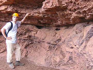 Morocco: Dr Ivan Fabuel Perez examines Triassic red beds in the High Atlas.